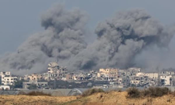 Smoke rises over destroyed buildings in Gaza, as seen from southern Israel.