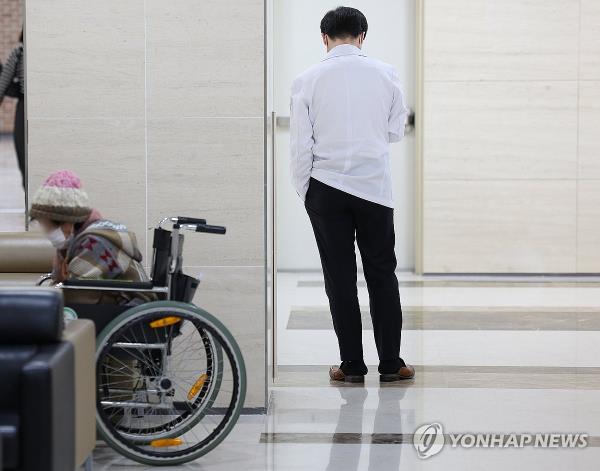 A doctor stands in a hallway at a hospital in Daegu, 237 kilometers south of Seoul, on March 25, 2024. (Yonhap)