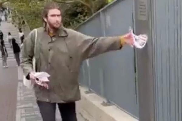 UPenn student tears down posters