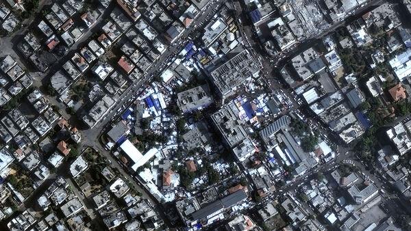 'We are inside a circle of death': Gaza's Al Shifa hospital has tanks at its gates