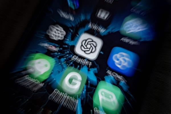 This illustration picture shows icons of Google's AI (Artificial Intelligence) app BardAI (or ChatBot) (centre left), OpenAI's app ChatGPT (centre right) and other AI apps on a smartphone screen. — AFP