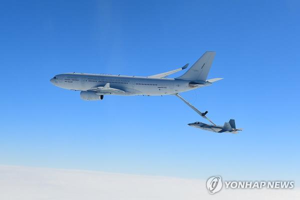 This photo, provided by the Defense Acquisition Program Administration on March 19, 2024, shows a KF-21 fighter jet under development successfully undergoing air-to-air refueling for the first time over waters off the southern coast. (PHOTO NOT FOR SALE) (Yonhap)