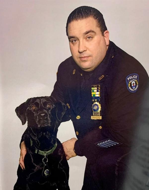 Detective Joseph Trancho with canine.