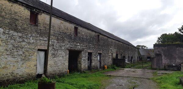 The farm buildings and house are in need of some attention but hold enormous potential.
