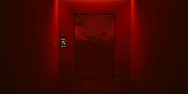 Hidden club door in a warehouse in Cyberpunk 2077.