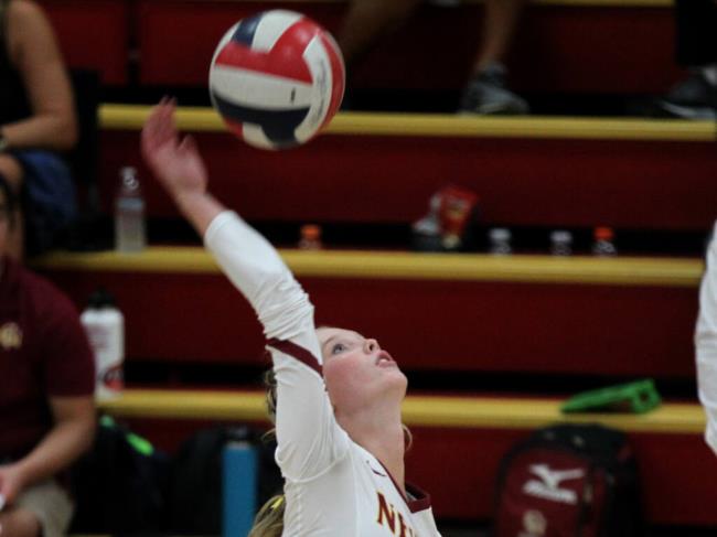 Cardinal Newman's Julia Waller makes a shot against Maria Carrillo, in girl's varsity volleyball, Thursday, Sept. 22, 2022, in Santa Rosa. (Darryl Bush / For The Press Democrat)