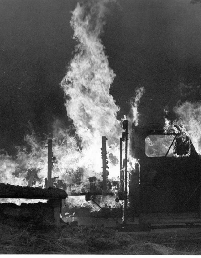An old flatbed truck is engulfed by a blizzard of white heat and flames during the Creighton Ridge Fire on the night of Aug. 9, 1978. The wildfire had started that afternoon, resulting from temperatures upward of 110 degrees and a spark from a lawnmower in dry grass. (Timothy Baker/The Press Democrat)